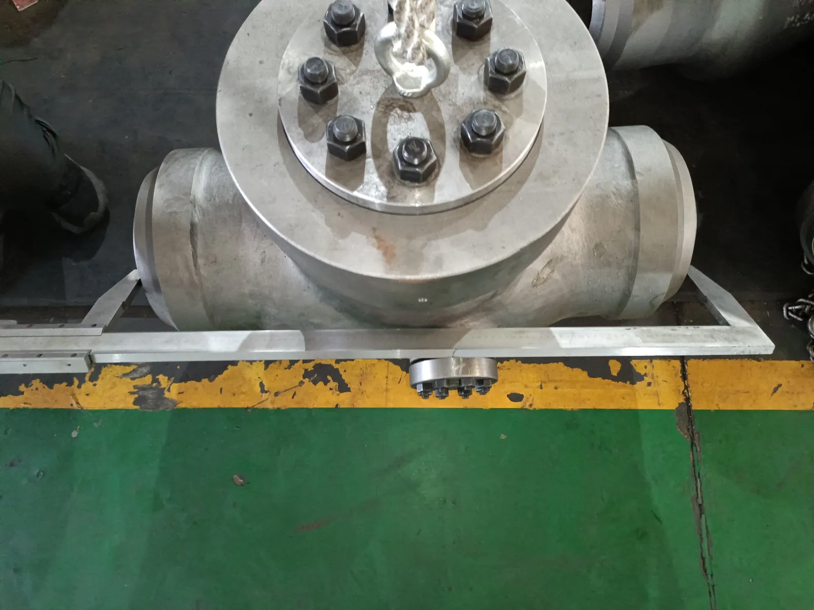 Face-to-face dimension of the assembled check valve measured with a large caliper bar